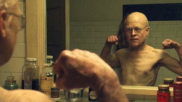 Benjamin Button looks in the mirror as an "old" child