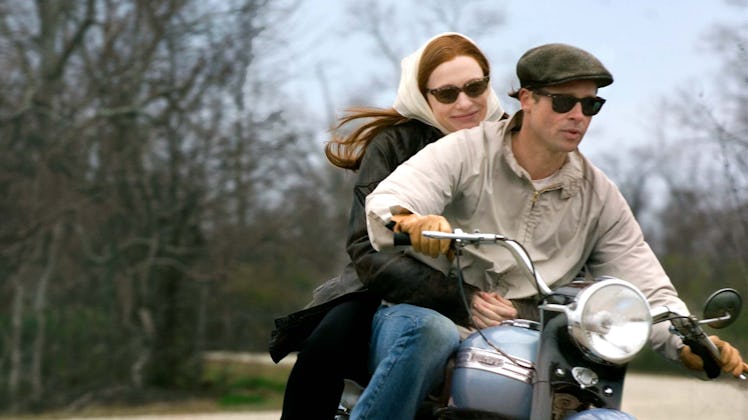 Benjamin Button rides a motorcycle with his love, Daisy