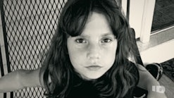 A black and white photo of Natalia Grace Barnet in the early 2010s.