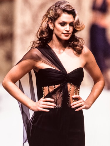 Cindy Crawford walks the runway at the Chanel Haute Couture Spring/Summer 1993 fashion show during t...
