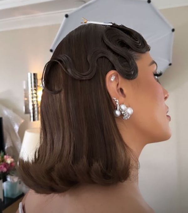Ashley Graham's 2023 Met Gala hair was styled by Justine Marjan.