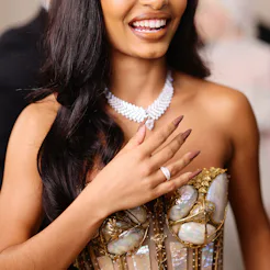 Yara Shahidi wore long light brown stiletto nails for the 2023 Met Gala.