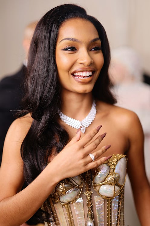 Yara Shahidi wore long light brown stiletto nails for the 2023 Met Gala.