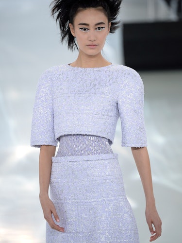 A model walks the runway at the Chanel Spring Summer 2014 fashion show during Paris Haute Couture Fa...