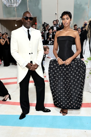 Idris Elba and Sabrina Dhowre Elba attend The 2023 Met Gala Celebrating "Karl Lagerfeld: A Line Of B...