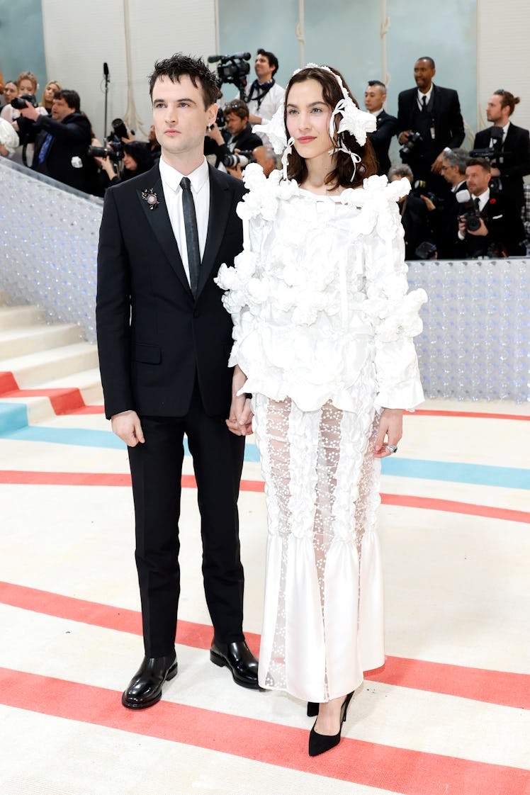 Tom Sturridge and Alexa Chung attend The 2023 Met Gala Celebrating "Karl Lagerfeld: A Line Of Beauty...