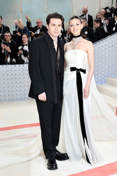 Brooklyn Beckham and Nicola Peltz Beckham attend The 2023 Met Gala Celebrating "Karl Lagerfeld: A Li...