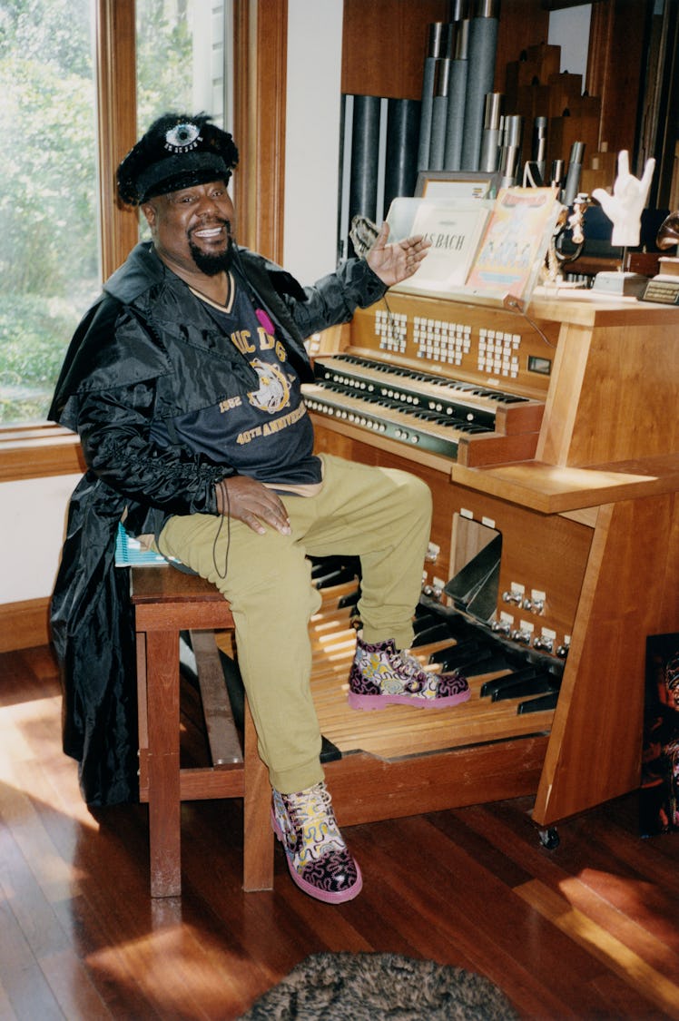 George Clinton wears his own clothing and accessories.