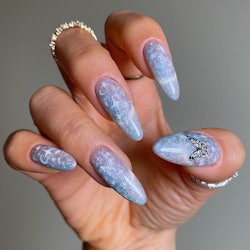 Butterfly nails are the perfect nail art design idea for gemini season 2023.