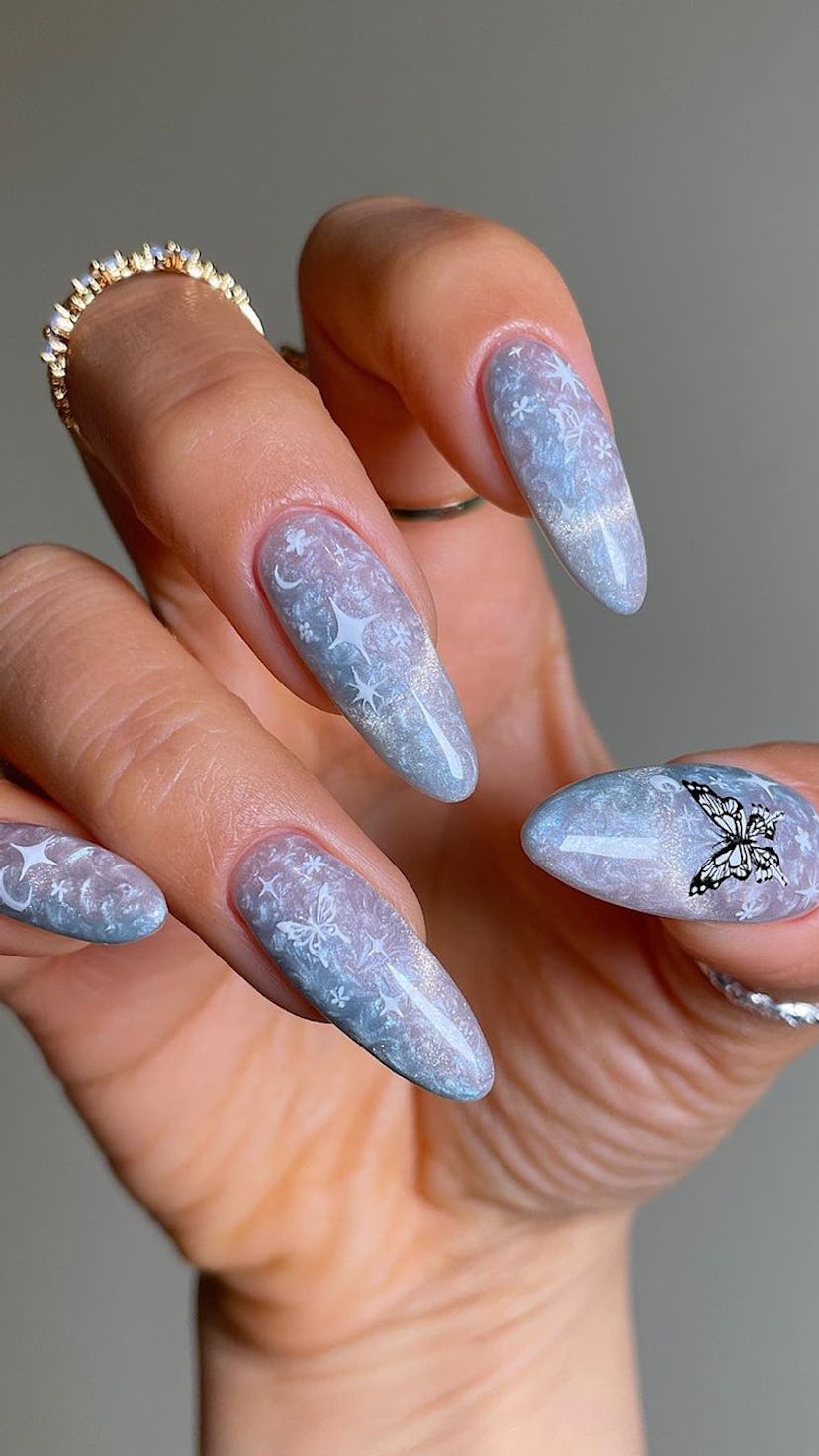 Butterfly nails are the perfect nail art design idea for gemini season 2023.