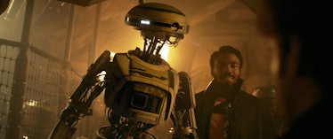 L3-37 (voiced by Phoebe Waller-Bridge) and Lando Calrissian (Donald Glover) in Solo: A Star Wars Sto...