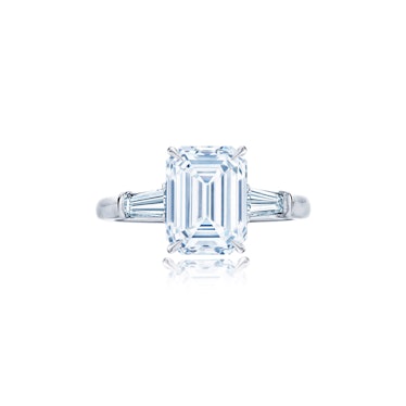 Kwiat Engagement Ring with an Emerald Cut Diamond and Baguette Side Stones
