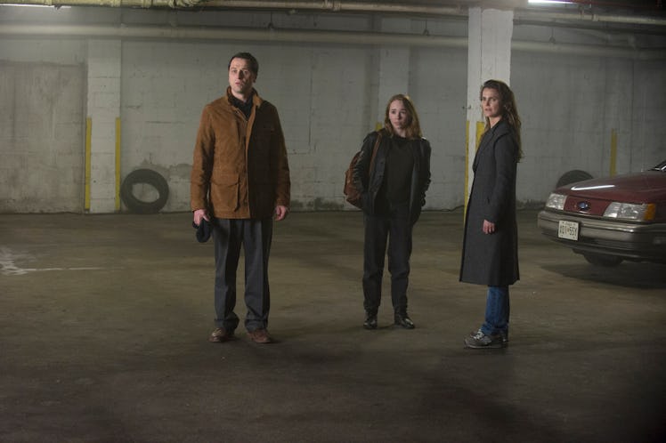 Philip, Elizabeth, and Holly are cornered in a parking garage. 