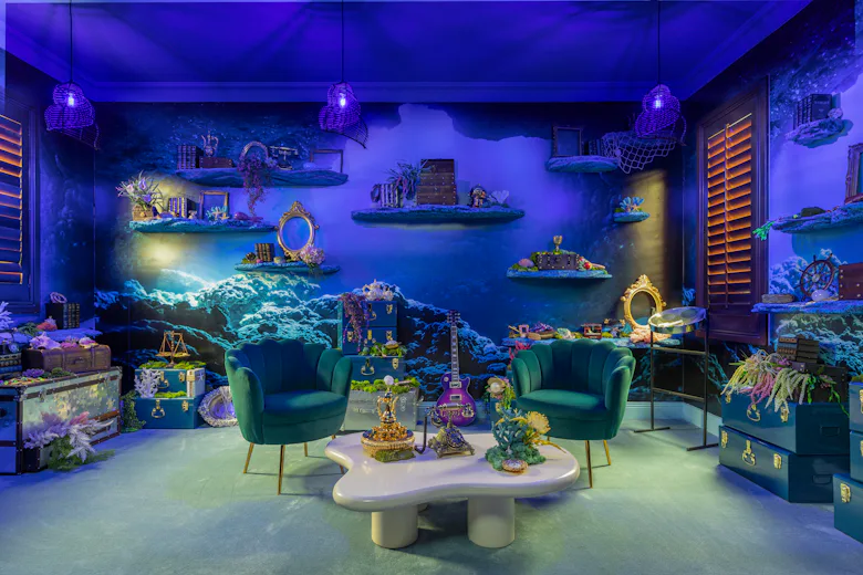 Inside Booking.com's 'Little Mermaid' "Under The Sea" Beach House