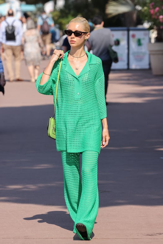 Iris Law wears a green Simon Miller and Mango Knit Set in Cannes.