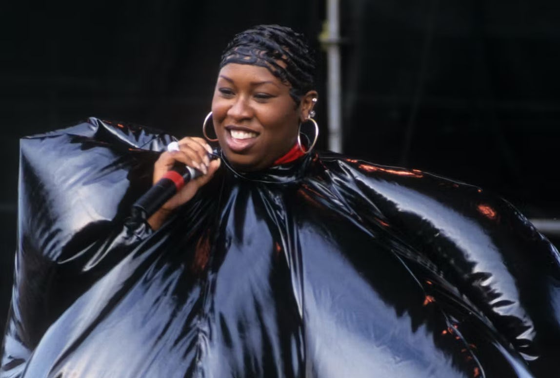 June Ambrose Made Missy Elliott's Garbage Bag Suit With Tire Glue & A