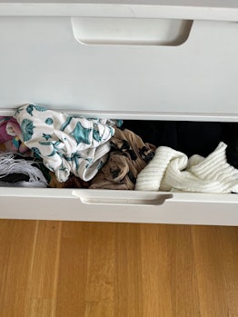 The author declutters her swimsuit drawer using the Viral CORE 4 method.