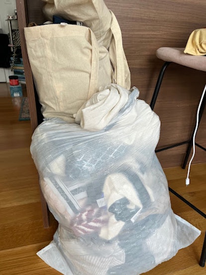 The writer shares a bag of the clothes she's getting rid of during her spring cleaning.