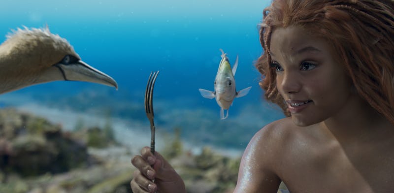 Scuttle (voiced by Awkwafina), Flounder (voiced by Jacob Tremblay), and Halle Bailey as Ariel in Dis...