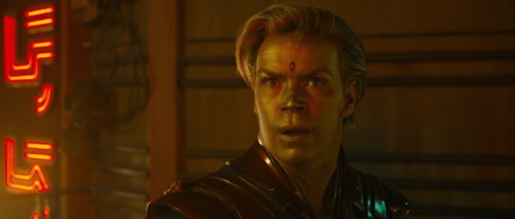 Will Poulter's Adam Warlock stands on a Knowhere rooftop in Guardians of the Galaxy Vol. 3