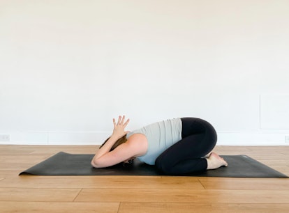 Try child's pose to release tension in your shoulders and neck after a long flight.