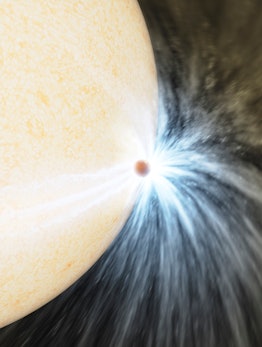 A tiny planet gives of streaks of white light as it crashes into a huge yellow star on a black backg...