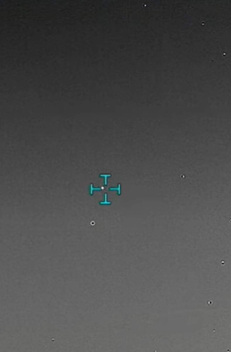 A resolved UAP sighting. The dot in the middle, and two dots that appeared to move in tandem with th...