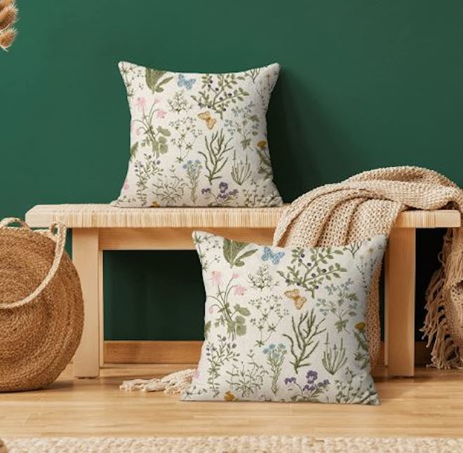 These decorative throw pillow covers add a natural floral touch to your living room.