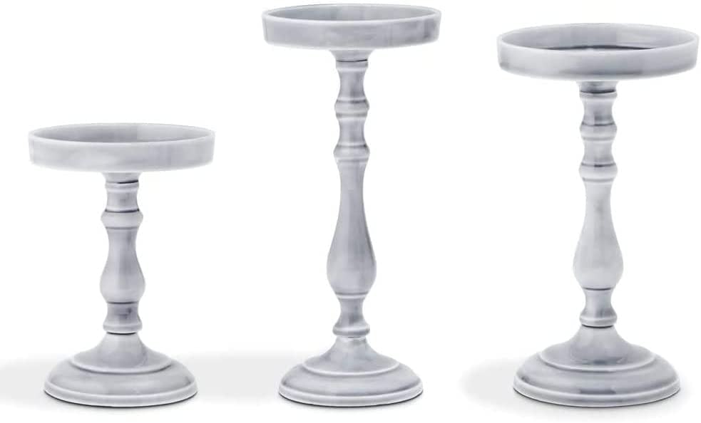 Use these decorative candle holders to elevate pillar candles for centerpieces or on top of your man&hellip;