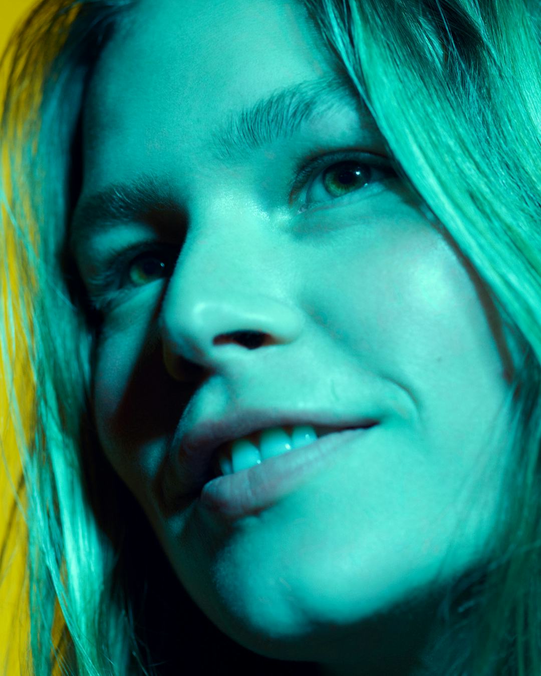 A model bathed in blue light