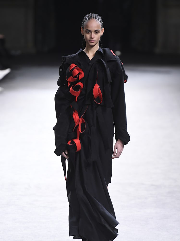 Model on the runway at Yohji Yamamoto Fall 2023 Ready To Wear Fashion Show on March 3, 2023 at Hotel...