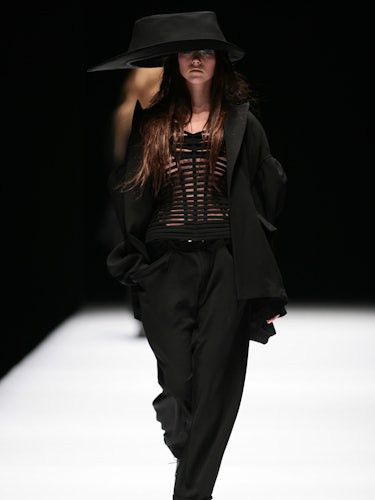 A model on the runway at Yohji Yamamoto's fall 2006 show at the Espace Ephemere Tuileries.