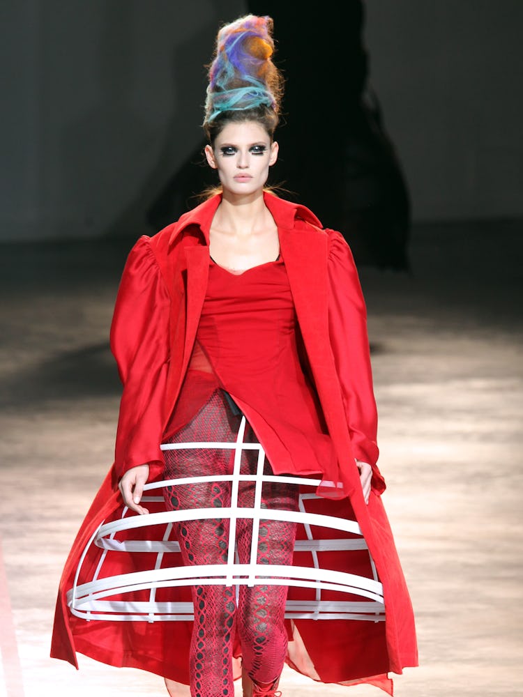 A model presents a creation by Japanese designer Yohji Yamamoto during the Autumn/Winter 2011-2012 r...