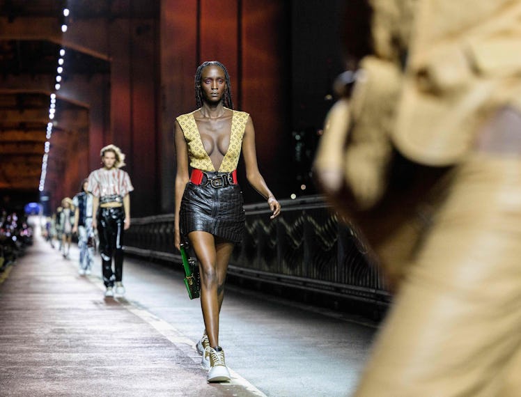 Congolese-Belgian rapper Lous and the Yakuza wears a creation during the Louis Vuitton Pre-Fall 2023...