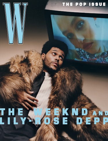 The Weeknd wears a black tie, brown fur coat, pin-stripe button-down shirt, and black pants.