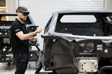 A Lamborghini factory worker wearing a HoloLens 2