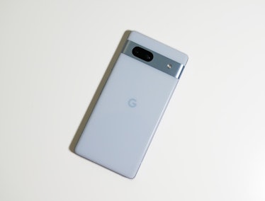 The back of the blue Pixel 7a.