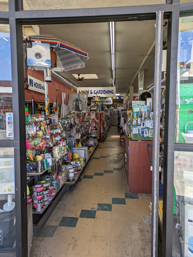 A wide shot of a store's doorway from the Pixel 7a.