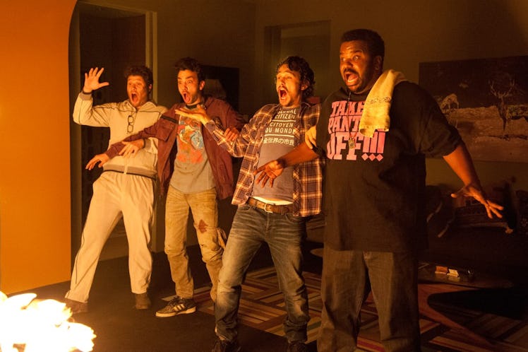Seth Rogen, Jay Baruchel, James Franco, and Craig Robinson stand near a ball of fire in This is the ...