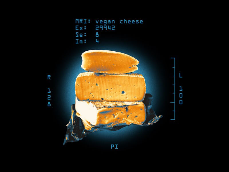 three wheels of cheese stacked on top of each other