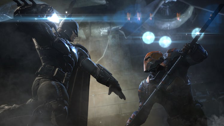 Deathstroke fighting Batman