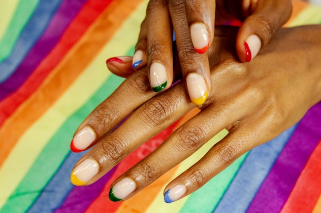 Pride rainbow nails design, colorful French tips