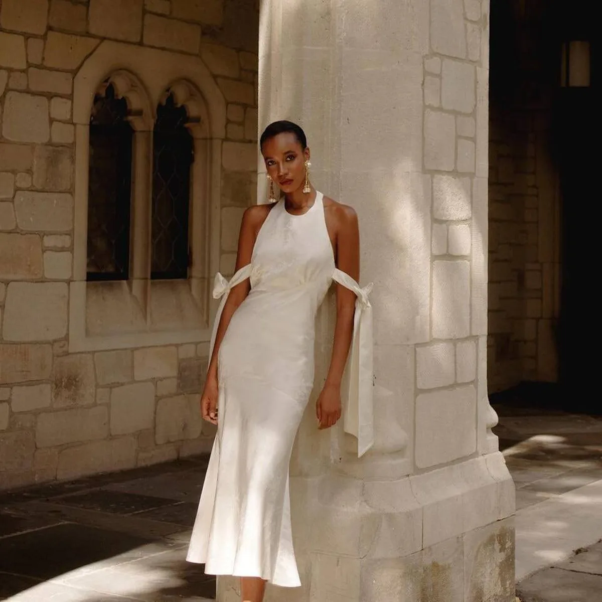 10 Midi Wedding Dresses That Toe The Line Between Timeless & Trendy 10 Midi Wedding Dresses That Toe The Line Between Timeless & Trendy