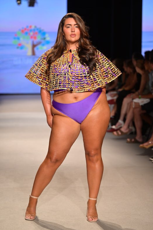plus-size model walks the runway for culture tree during Paraiso Miami Swim Week 2023 in a bikini