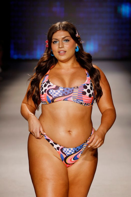 plus-size model ella halikas walks the runway for ONEONE during Paraiso Miami Swim Week 2023 in a bi...