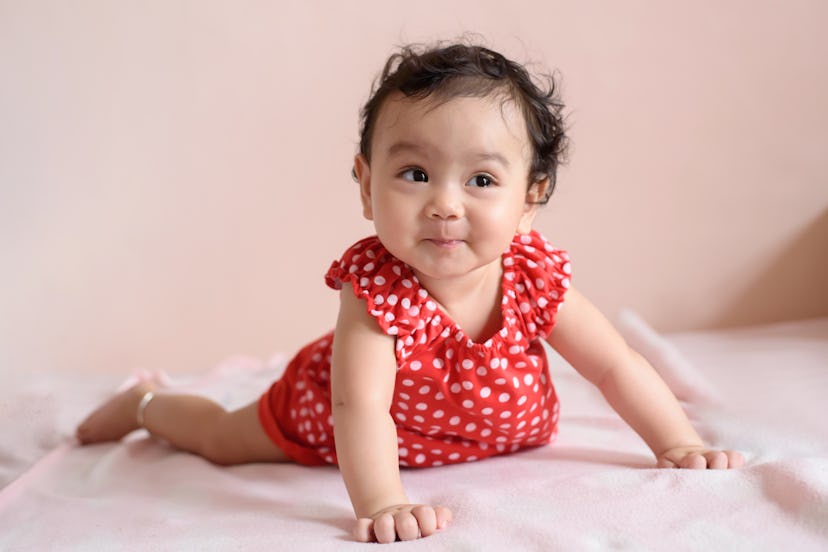 A cute baby crawling in a photography studio. Celeste is a beautiful name if you like Luna but want ...