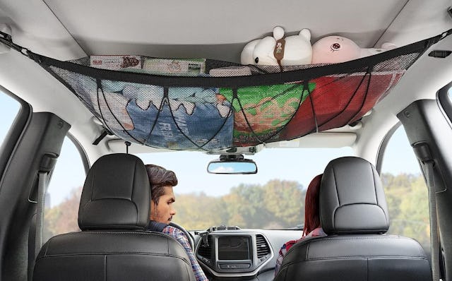 A ceiling cargo net is a fantastic way to corral stuff on long road trips.