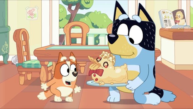 Bandit presenting Bingo with a duck cake.