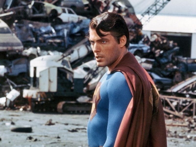 Christopher Reeve stands in a junkyard in Superman III