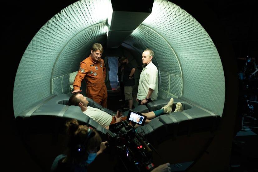 Aaron Paul, Josh Hartnett with Director John Crowley in a behind-the-scenes set photo from 'Black Mi...